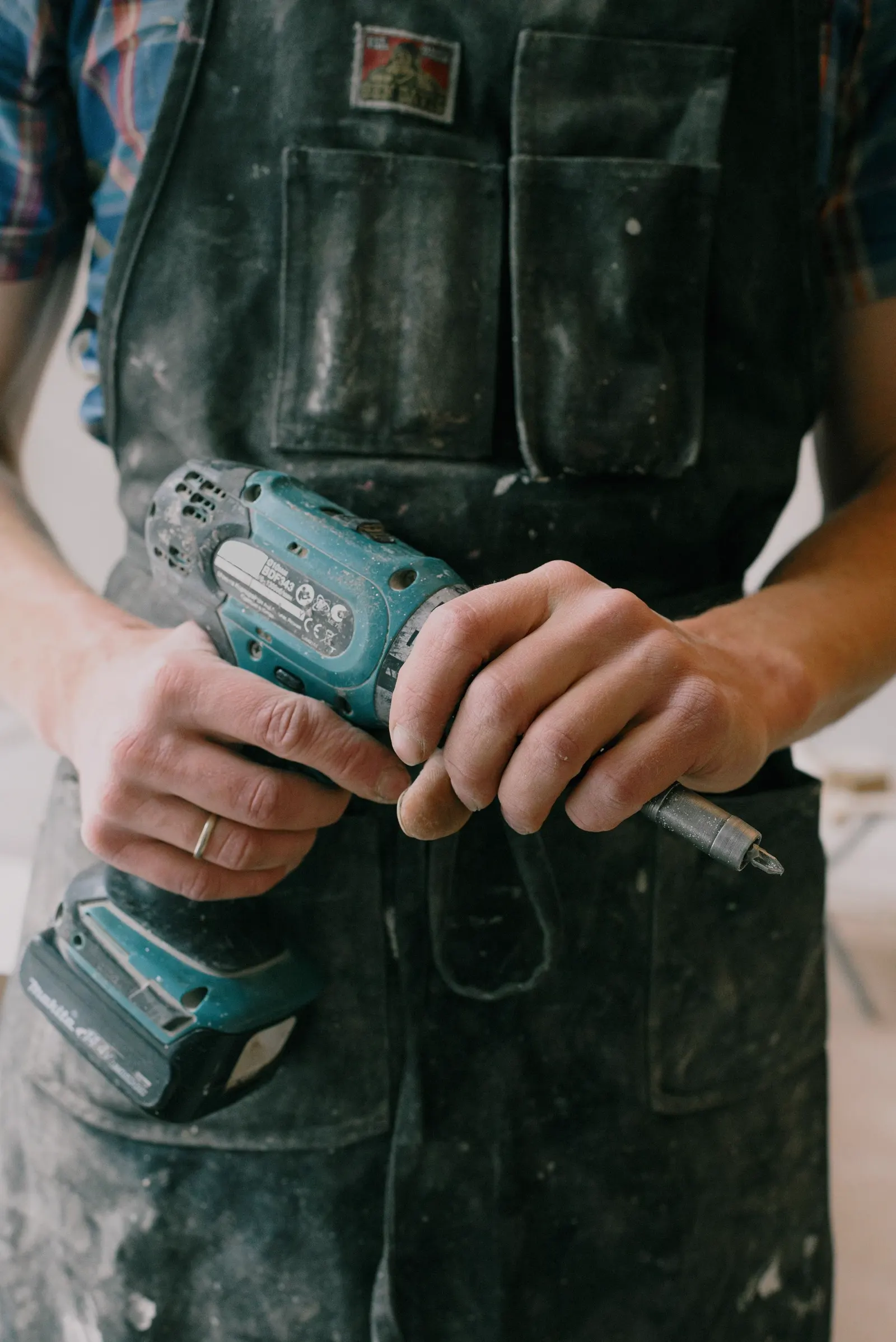 Handyman making repairs at a residential property